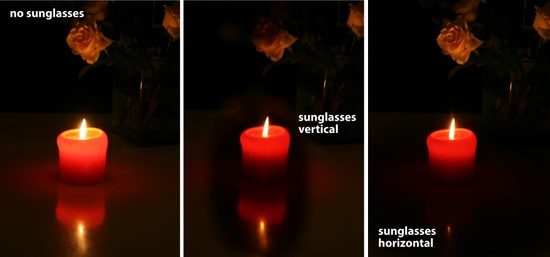 reflection of a candle seen through sunglasses